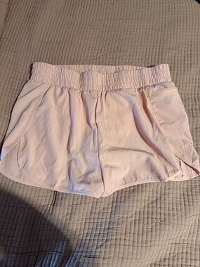 Women’s Light Pink Athletic Shorts with Elastic Waist and Zip Pocket